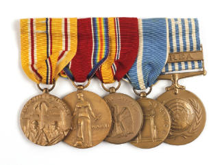 Front of ribbon bar with five World War II service medals attached