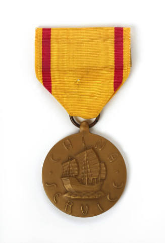 Front of China Service Medal with yellow and red striped ribbon and circular bronze medal with …