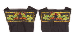 Two liberty cuff patches, each has two green and yellow dragons flanking the word "Vietnam"