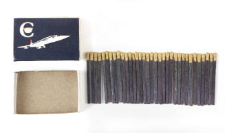 Blue matchbox with white image of Concorde airplaine on cover, with matchsticks with gold heads