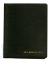 Black hardcover binder that reads "U.S.S. Intrepid (CV-11)" in gold