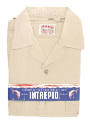 Folded khaki shirt with a blue paper band wrapped around that says "Intrepid, Courtesy of the s…