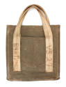 One side of green fabric tote bag with "Paschall" and "VS 27" handwritten on the white straps