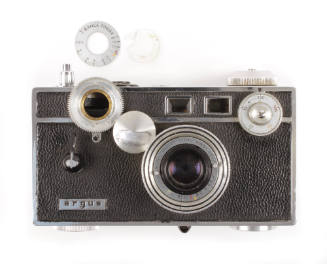 Argus C3 Rangefinder camera with black plastic body and various lenses and knobs