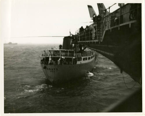 Black and white photograph of a tanker than narrowly avoided colliding with USS Intrepid