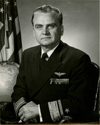 Black and white portrait photograph of a U.S. Navy admiral in a dress blue uniform