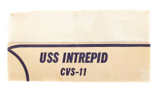 Paper garrison cap with mesh top, blue printed text reads “USS Intrepid CVS-11”