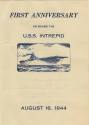 Printed program for USS Intrepid's first anniversary with a blue ink drawing of an aircraft car…