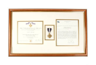 Framed Navy Cross certificate, Navy Cross medal, and citation presented to Alonzo A. Swann