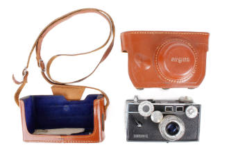 Argus Rangefinder camera and leather carrying case with strap, case is shown separated in two p…