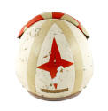 Back view of U.S. Navy flight helmet, orange four-sided star is in the center of two beige stri…