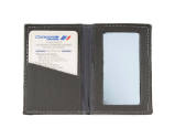 Black vinyl case open to show the Concorde information card inserted on the left and mirror ins…