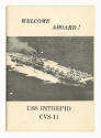 Booklet titled “Welcome Aboard! USS Intrepid CVS-11” with black and white photo of aircraft car…