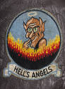 Detail photograph of Fighting Squadron 71 insignia patch with an image of a devil above the wor…