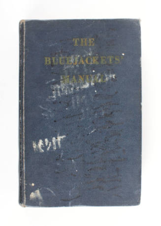 Blue hardcover book titled "The Bluejackets' Manual"