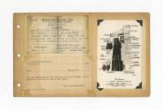 Tan scrapbook page 51 with one Recruit Identification Card, change of address card, and a postc…