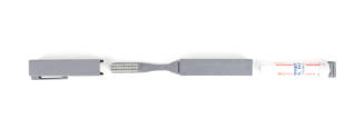 Gray plastic toothbrush with cap and toothpaste insert