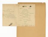 Tan scrapbook with open USS Intrepid Thanksgiving Day menu dated November 23, 1944