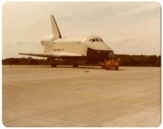 Color photograph of Space Shuttle Enterprise on a runway 