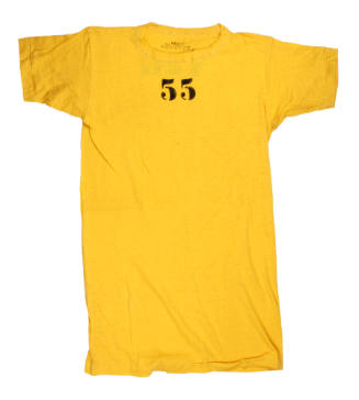 Yellow short sleeved t-shirt with "55" stenciled at top center in black