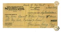 Printed check with "Bank of My Heart" handwritten on the top dated September 30, 1928