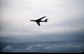 Color photograph of a Russian bomber in flight