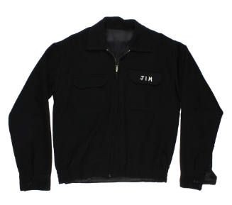 Black cruise jacket with "Jim" embroidered on chest pocket