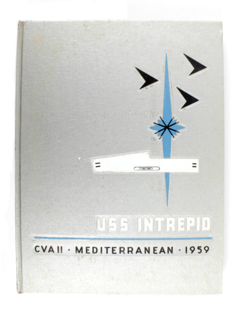 Silver hardcover USS Intrepid cruise book for 1959 with a stylized drawing of Intrepid