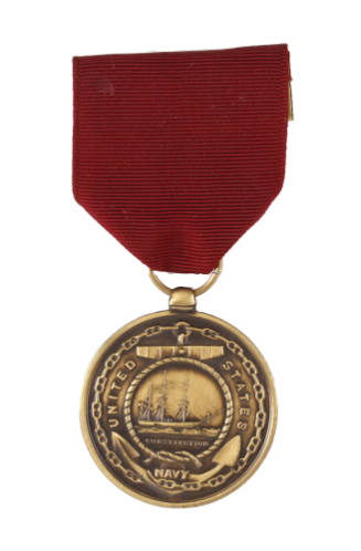Front of Navy Good Conduct Medal with red ribbon and image of raised anchor and the ship USS Co…