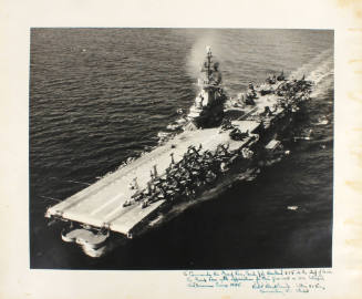 Black and white photograph of USS Intrepid at sea with a handwritten inscription on the bottom …