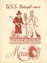 Printed USS Intrepid menu for Thanksgiving 1957 with a drawing of a pilgrim, a sailor and a tur…