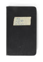 Black logbook with "#2 12-3-43 to 4-3-43" written on a piece of tape in blue ink