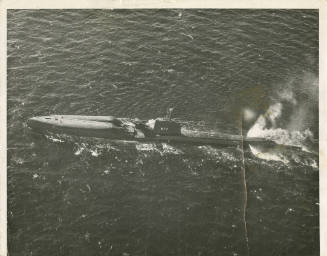 Black and white photograph of the submarine USS Growler at sea, from above