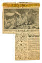 Printed newspaper clipping with a black and white photograph of Japanese officers signing the t…