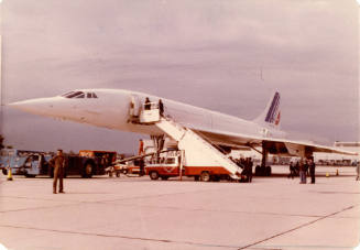 Printed color photograph of an Air France Concorde on the tarmac at JFK