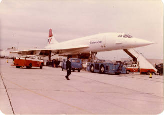 Printed color photograph of a British Airways Concorde on the tarmac at JFK