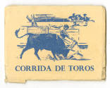 Printed souvenir photo booklet titled "Corrida de Toros" with a drawing of a matador and bull