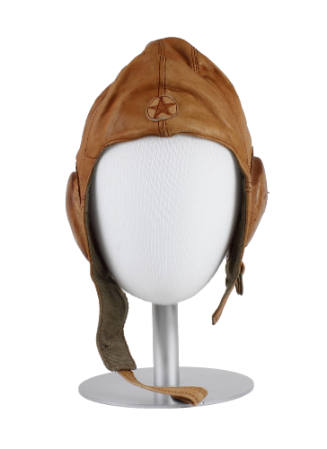 Tan leather Japanese flight helmet on a mannequin head stand