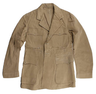 U.S. Navy khaki working uniform jacket with no buttons or insignia