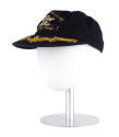 Side view of "The Fighting Lady" baseball cap with gold oak leaves on brim, on a mannequin head…