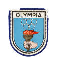 Shield shaped patch with blue felt backing and colored image of Olympic rings and torch