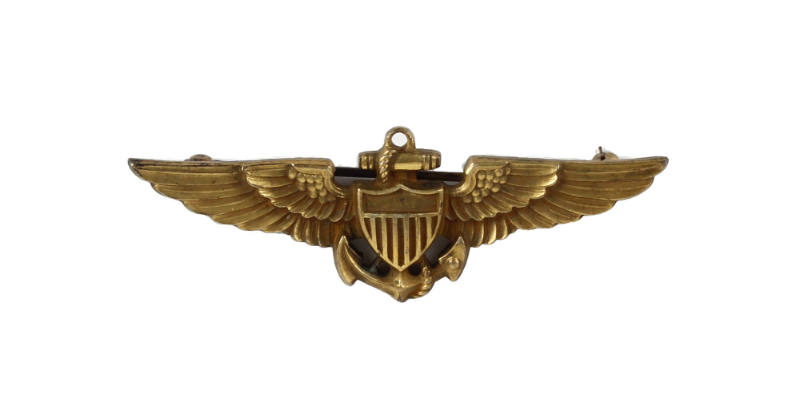 Gold U.S. Naval Aviator pin with outstretched wings