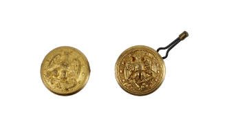 Two large gold U.S. Navy uniform buttons with image of eagle with outstretched wings, one butto…