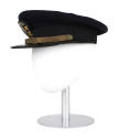 U.S. Navy officer combination cap with navy blue cover, side view displayed on a mannequin head…