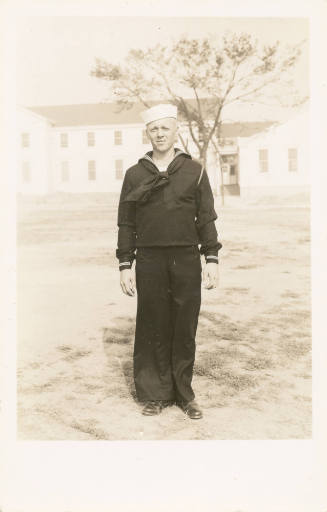 Printed black and white photograph of Byron B. Joslin in a U.S. Navy enlisted blue dress unifor…