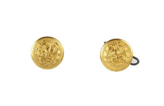 Two small gold U.S. Navy uniform buttons with image of eagle with outstretched wings, one butto…