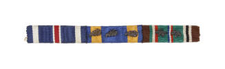 Ribbon bar with three multicolored striped ribbons and bronze oak leaf devices