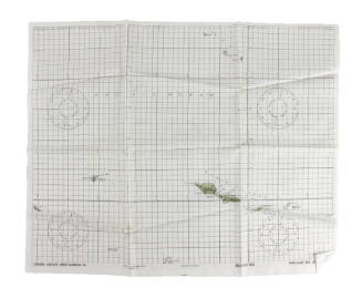 Silk navigational chart with cartographic markings and green land masses
