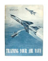 Blue and white softcover book titled "Training Your Air Navy" with drawings of two aircraft in …