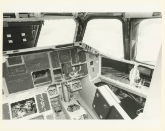 Printed black and white photograph of space shuttle Enterprise's cockpit with instruments remov…